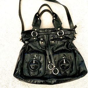 Eliot Luca black patent bag